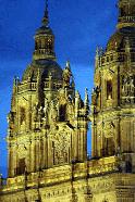 The evening lights shine on several outstanding churches in Salamanca